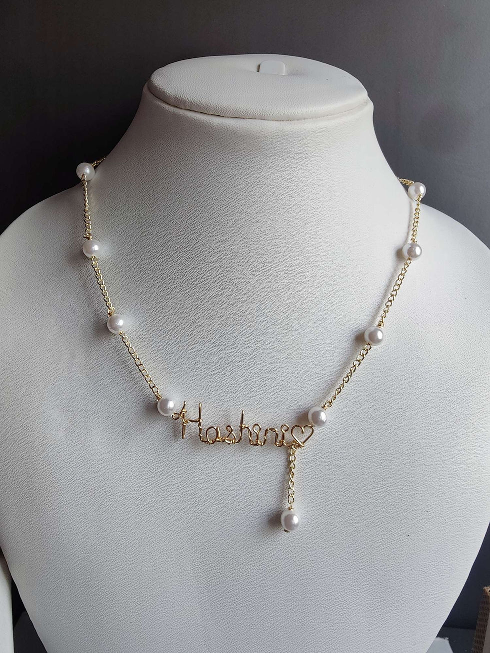 Name pearl chain with pearl chain hanging