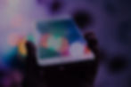 Person holding cellular phone