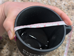 Measuring the circumference of a coffee mug for Pi Day