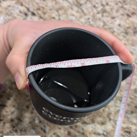 Measuring the circumference of a coffee mug for Pi Day