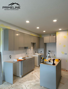 Modern grey kitchen renovation and painting by PrimeLine Calgary.