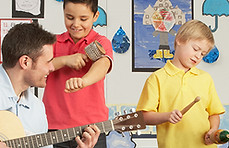 Male Teacher Playing Guitar