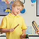 Male Teacher Playing Guitar