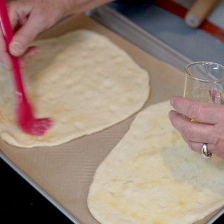 Apply Oil Before applying the topping to prevent the topping sipping into the dough