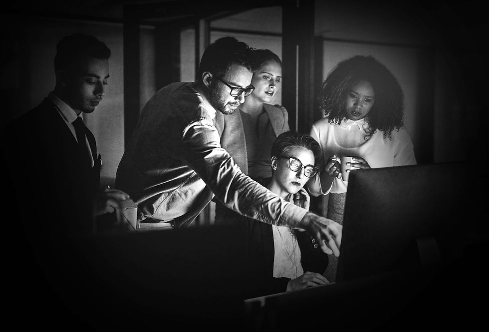 shot-of-colleagues-standing-together-as-they-work-2026-03-25-04-24-19-utc-resize