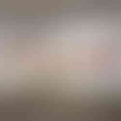 Gallery view of Nieves Saah’s The Labyrinth of Dreams exhibition with colorful paintings on white walls.