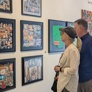Visitors at clio art fair at the artist booth