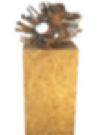 Wood sculpture with reflective tubes on a plywood pedestal. Natural textures and metallic reflections create a rustic, artistic feel.