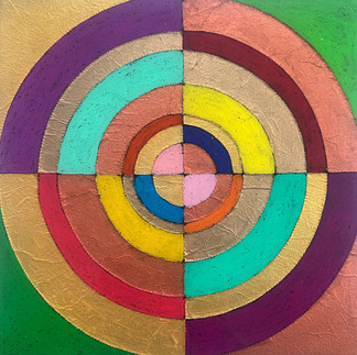 A vibrant circular abstract artwork with multiple color rings, including gold, turquoise, pink, and yellow, radiating from the center.
