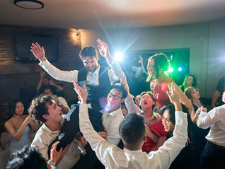 bride and groom crowdsurfing at a calgary wedding, sirocco golf club