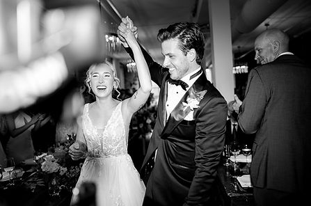 bride and groom holding hands at wedding in venue 308