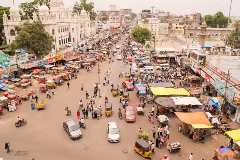 Indian Street Market with tents and cars