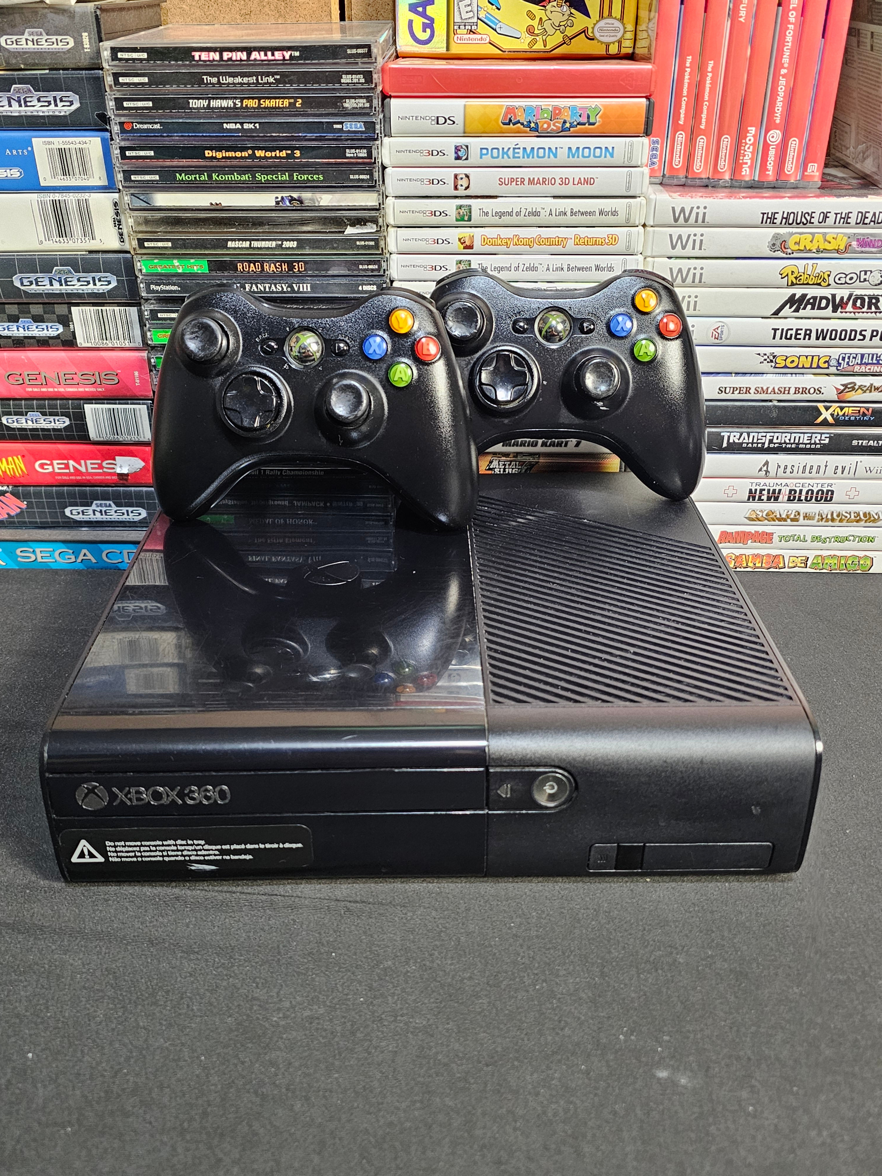 xbox 360 e with 2 controllers