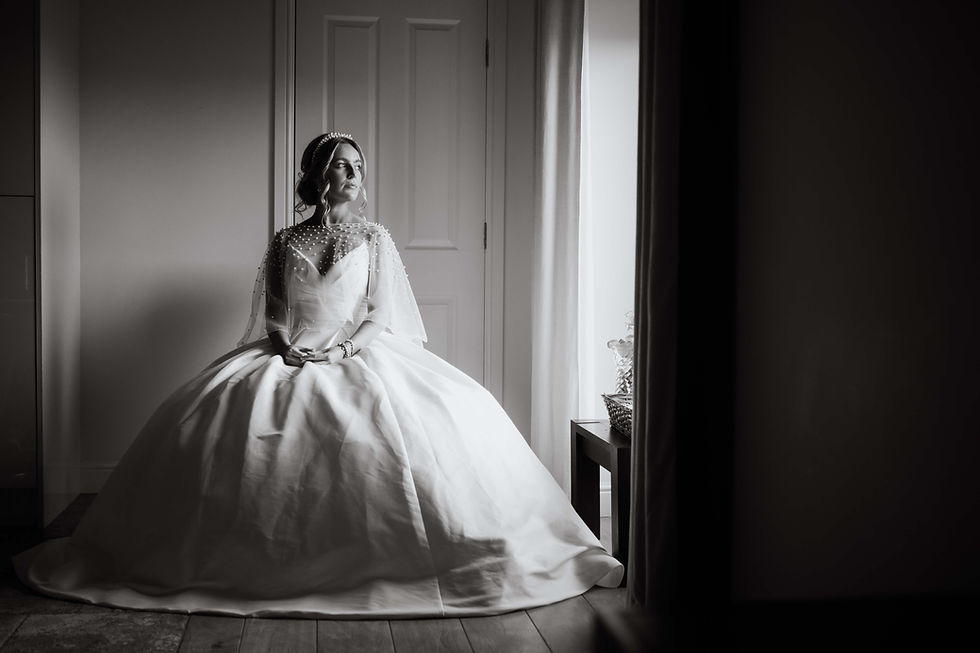 Bride in ballgown with elegant bridal hair Isle of Man.