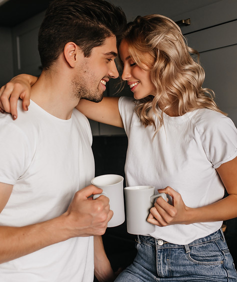inspired-girl-enjoying-morning-with-husband-indoor-portrait-chilling-couple-drinking-coffe