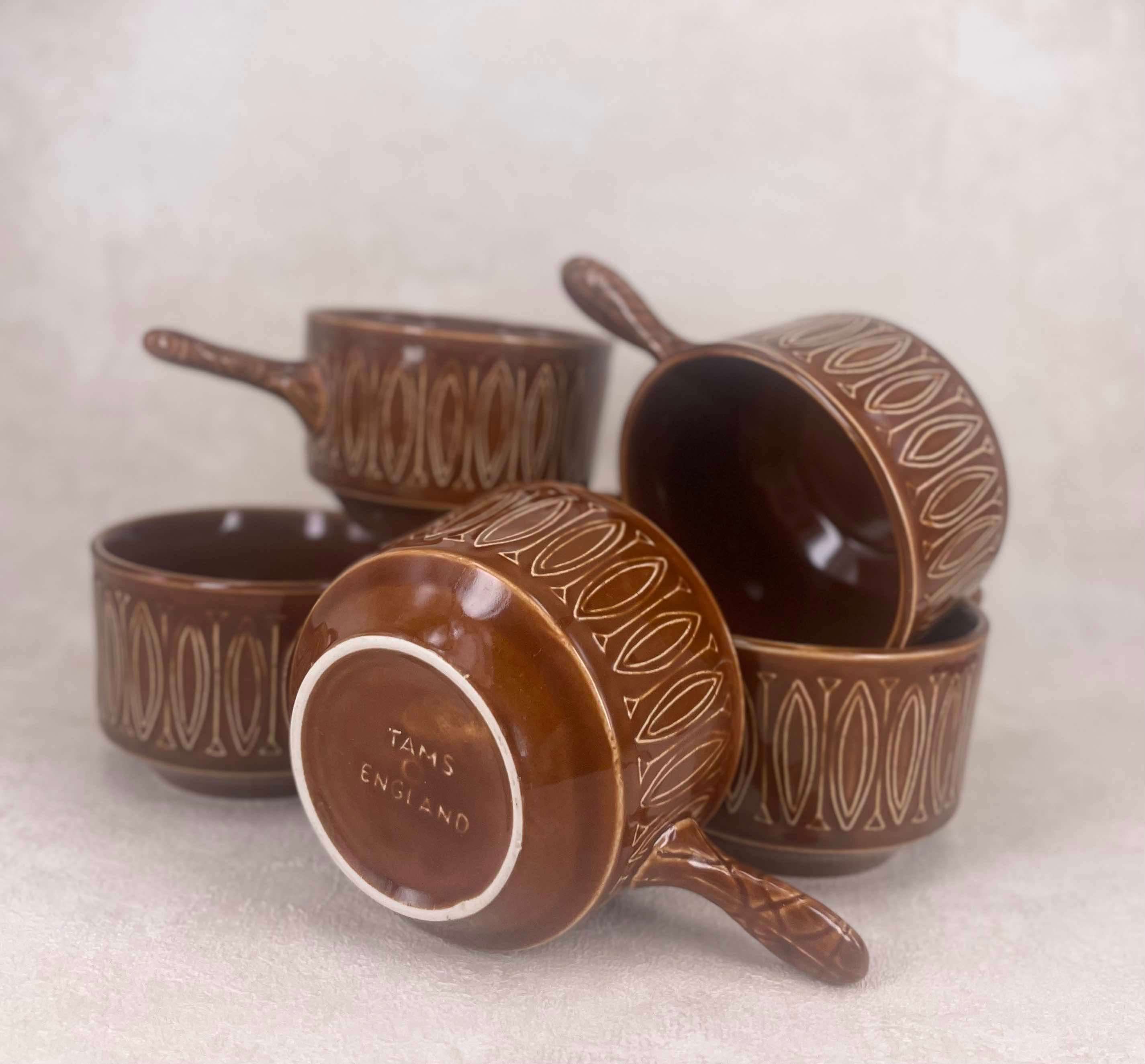Rare vintage Tams studio pottery soup bowls, each embossed with the maker's mark. Handcrafted in warm rustic brown.