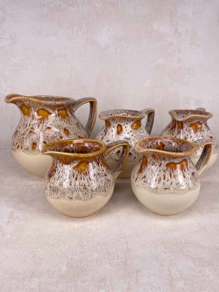 Thumbnail: Fosters Pottery Honeycomb drip glaze jug and plate set.