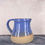 Thumbnail: Impressed maker's mark on studio pottery blue and natural stone jug