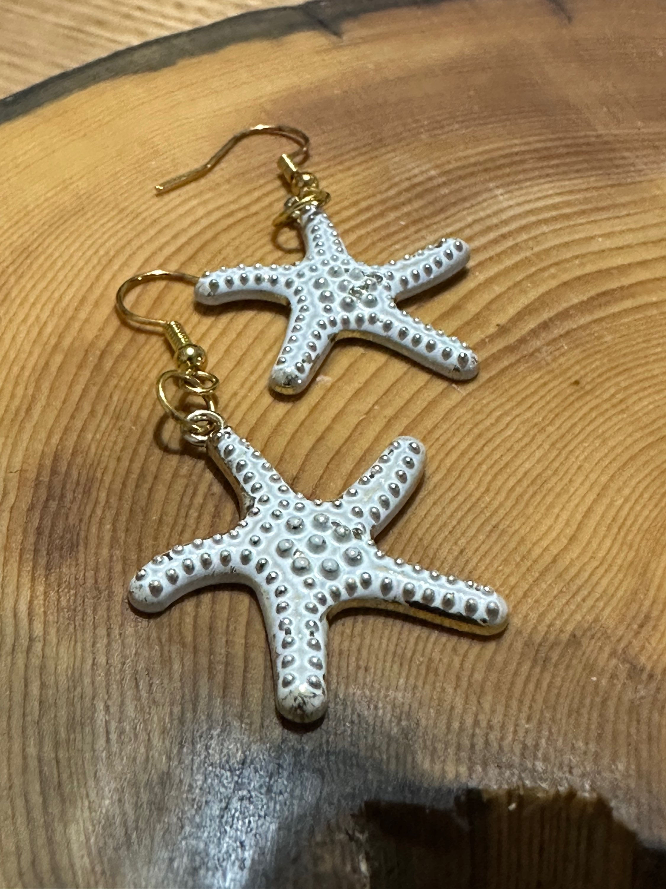 Gold starfish earrings 