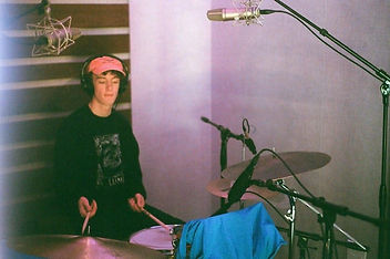 Ben LeBeau plays the drums while recording at old mill road recording studio, shot on film.