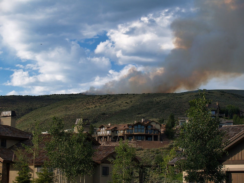 Too close for comfort. A forest fire from the driveway of our Vail Valley home.
