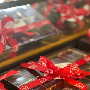 Boxes of Milk or Dark (or both) chocolate covered sea salt caramels Box of 15 with ribbon $35 Retail cost