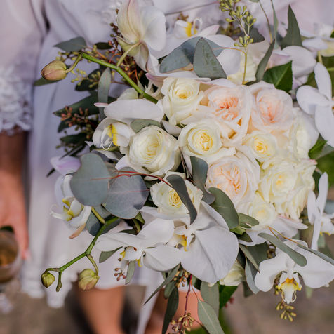 Bridal bouquet, cascade, phalaenopsis orchid, garden rose, seeded eucalyptus, Vizcaya wedding Darios flower Miami