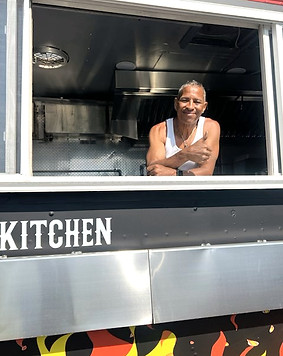 dom at foodtruck window_edited.jpg