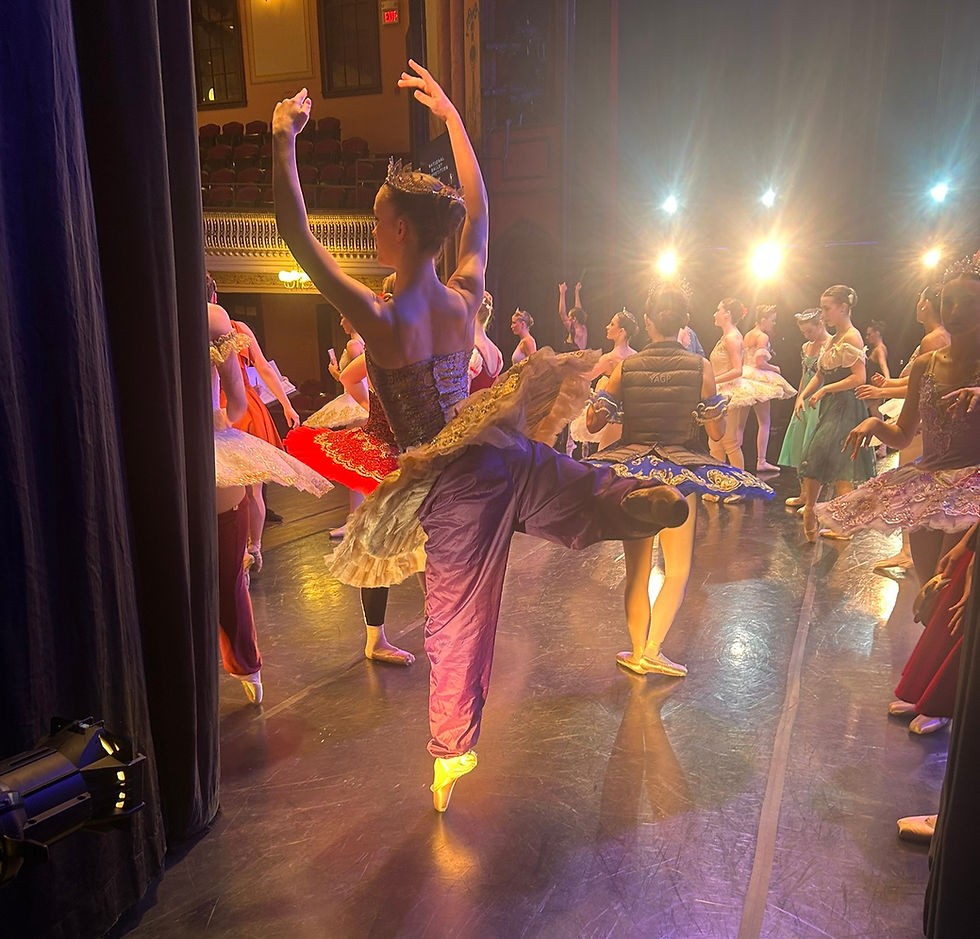 Carolyn practices with her warm-ups on during open stage time