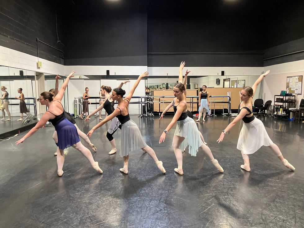 Amber (far right) and other summer intensive dancers pose in rehearsal