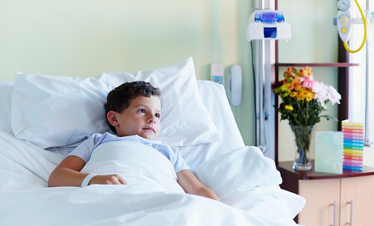Child In Hospital Bed