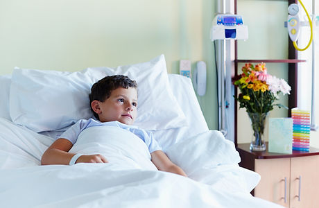 Child In Hospital Bed