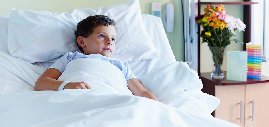 Child In Hospital Bed
