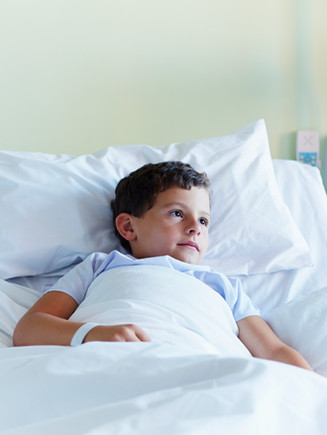 Child In Hospital Bed