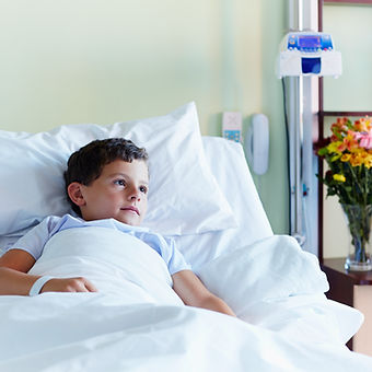 Child In Hospital Bed