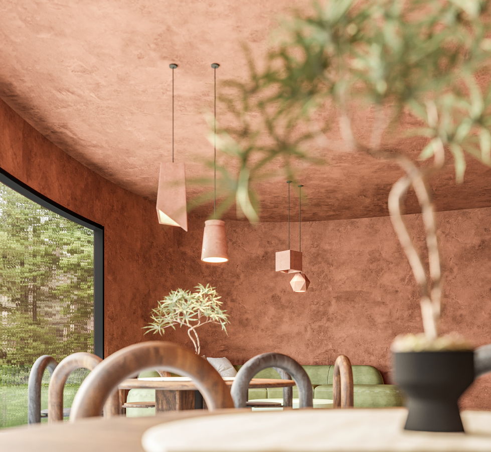 Contemporary Mediterranean interior restaurant with terracotta walls, arched openings, bold black-and-white geometric tile flooring, green velvet seating, and potted plants for contrast.