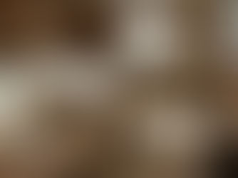 cream color soap on wood shelves