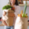 Woman holding grocery bag