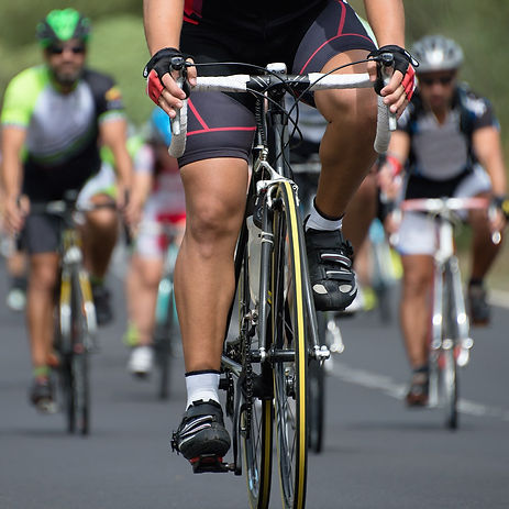 Biking in competition on road legs peddling