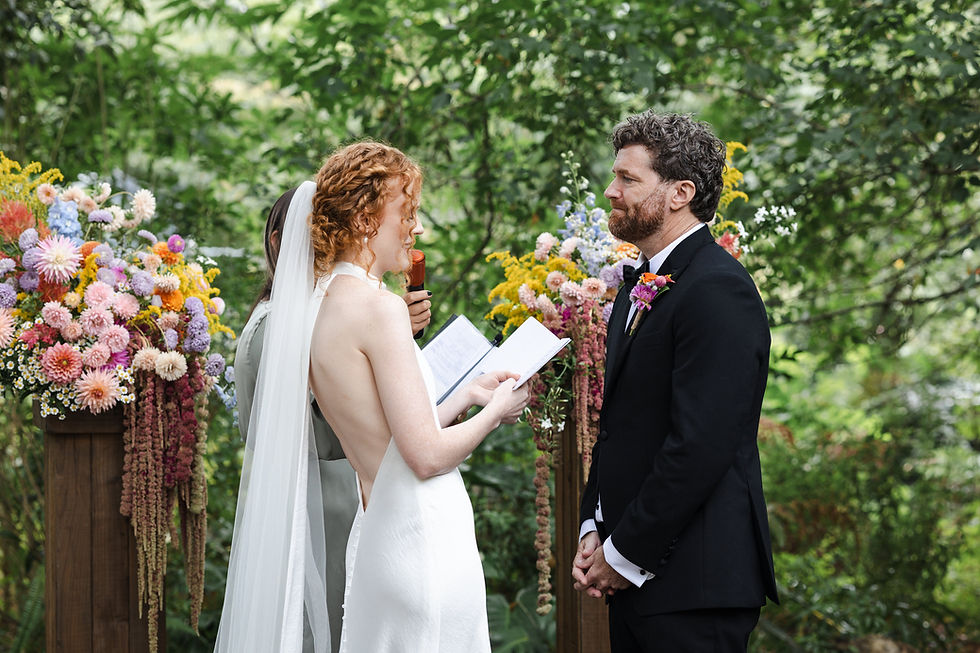 Bride and Groom at their wedding ceremony at Bay of Plenty Wedding Venue, Old Forest School - Photographed by Rose Minnee Photography