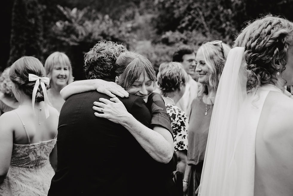 Guests congratulating Bride and Groom after their wedding ceremony at Old Forest School, Bay of Plenty Wedding Venue. Photographed by Tauranga Wedding Photographer Rose Minnee.