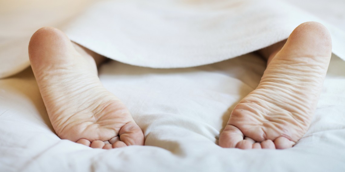 FEET UNDER BLANKET