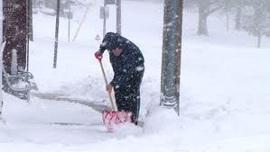 person shovelling snow