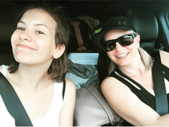 Tonya Flaming and her daughter in her car