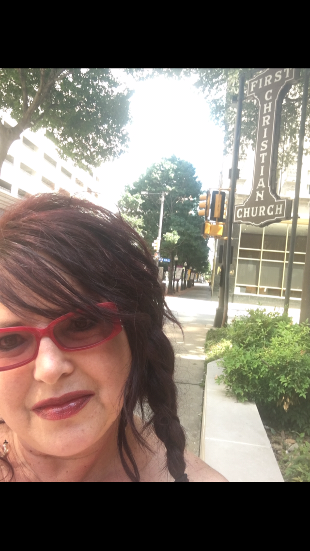 Shelly Trammel standing outside her church