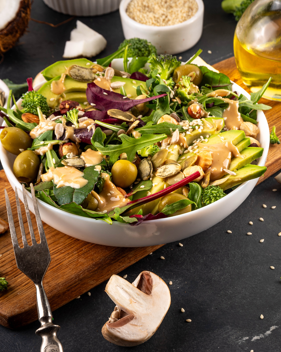 Avocado-Olive Salad with Broccoli, Seeds and Tahini Drizzle