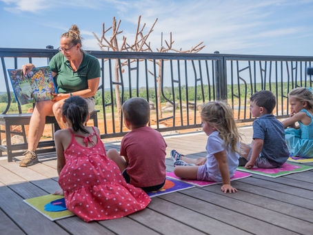 Toddlers Love Giraffes at "Tower Tales"