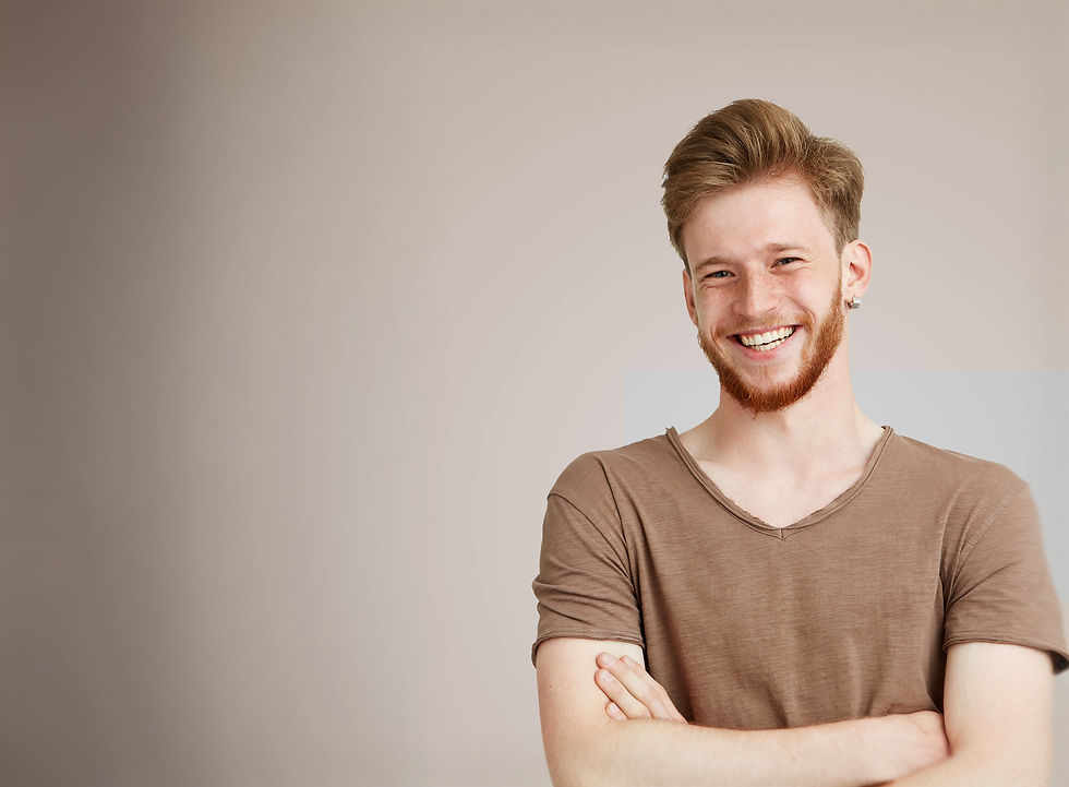 Smiling in Brown Shirt_edited.jpg