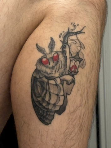 Stipple shaded black and gray Mothman tattooed in Eureka by Calcium tattoo