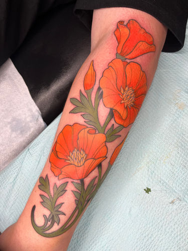 neo-traditional color California poppy tattoo done at Sangha Tattoo Studio by Calcium Art Tattoo in Eureka, California.